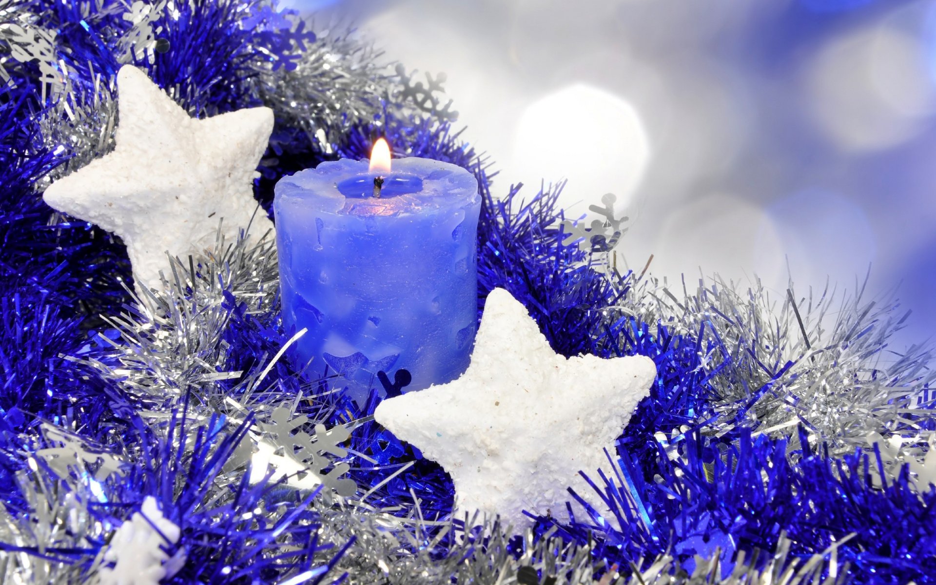 new year holiday happy new year candle candle tinsel decorations new year star stars asterisk blue