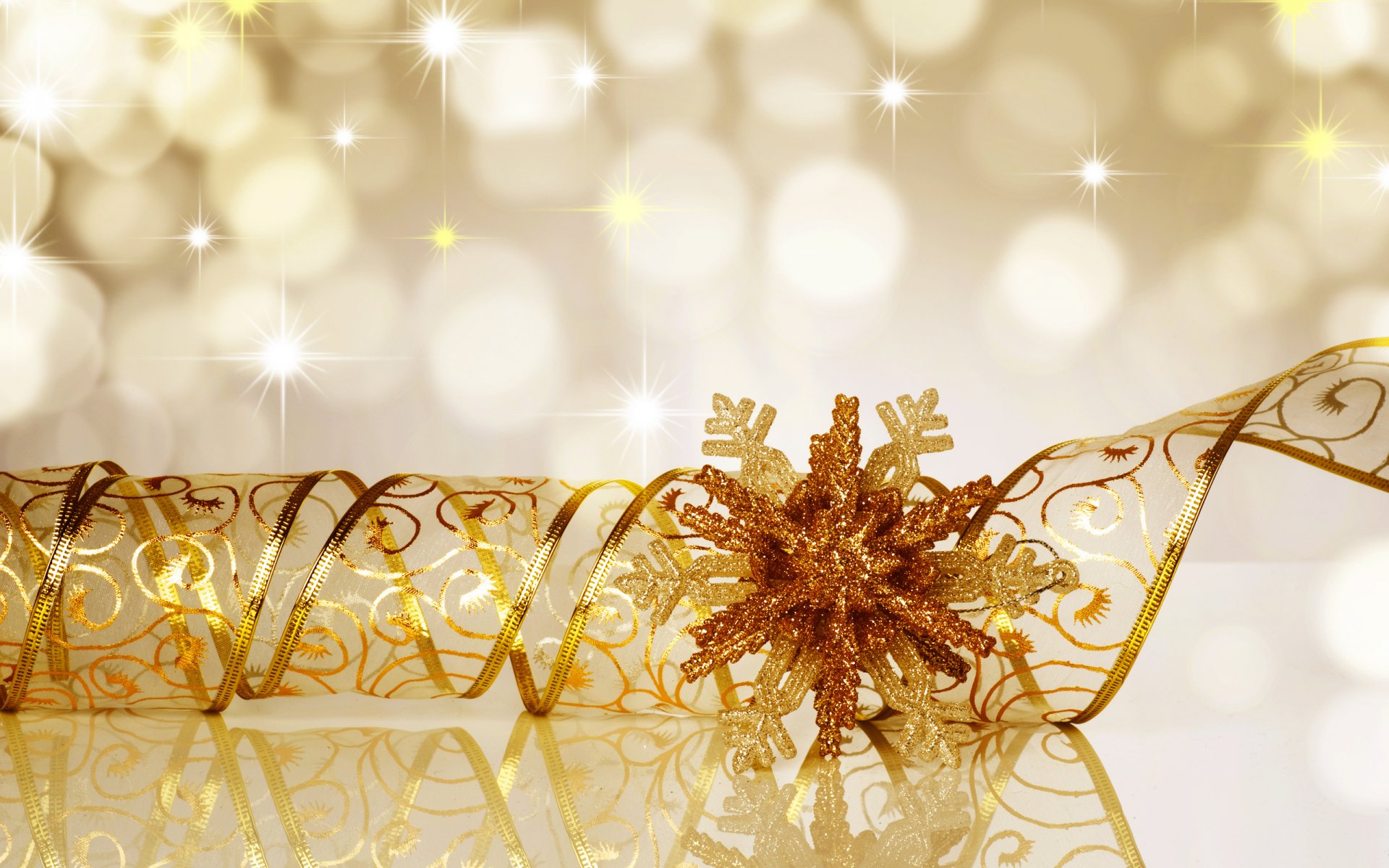 gold ribbon snowflake light