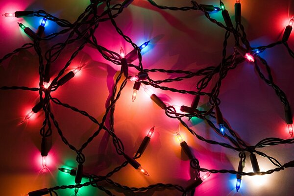 Christmas garland with colorful light bulbs