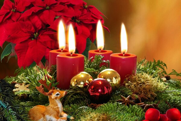 Christmas candles and a deer figurine