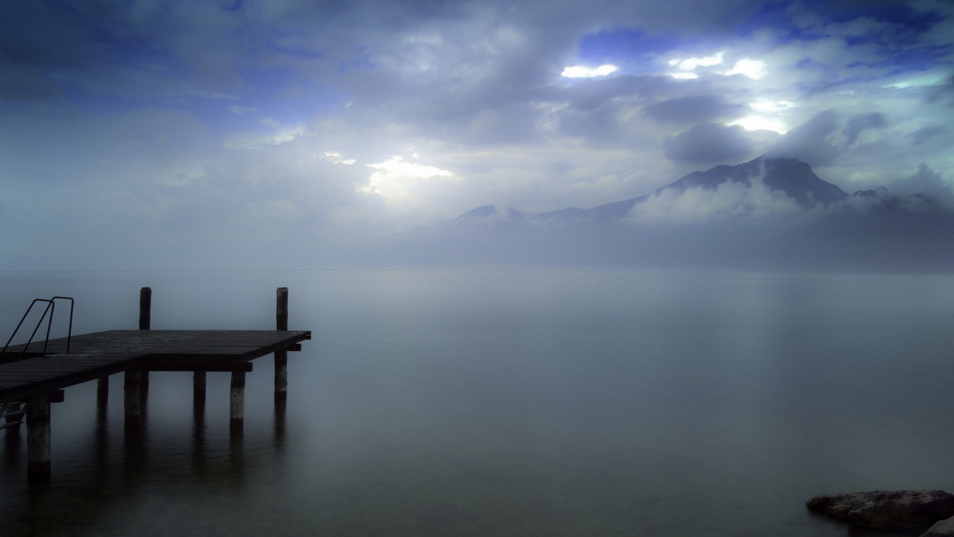 lake pier sky clouds mountain