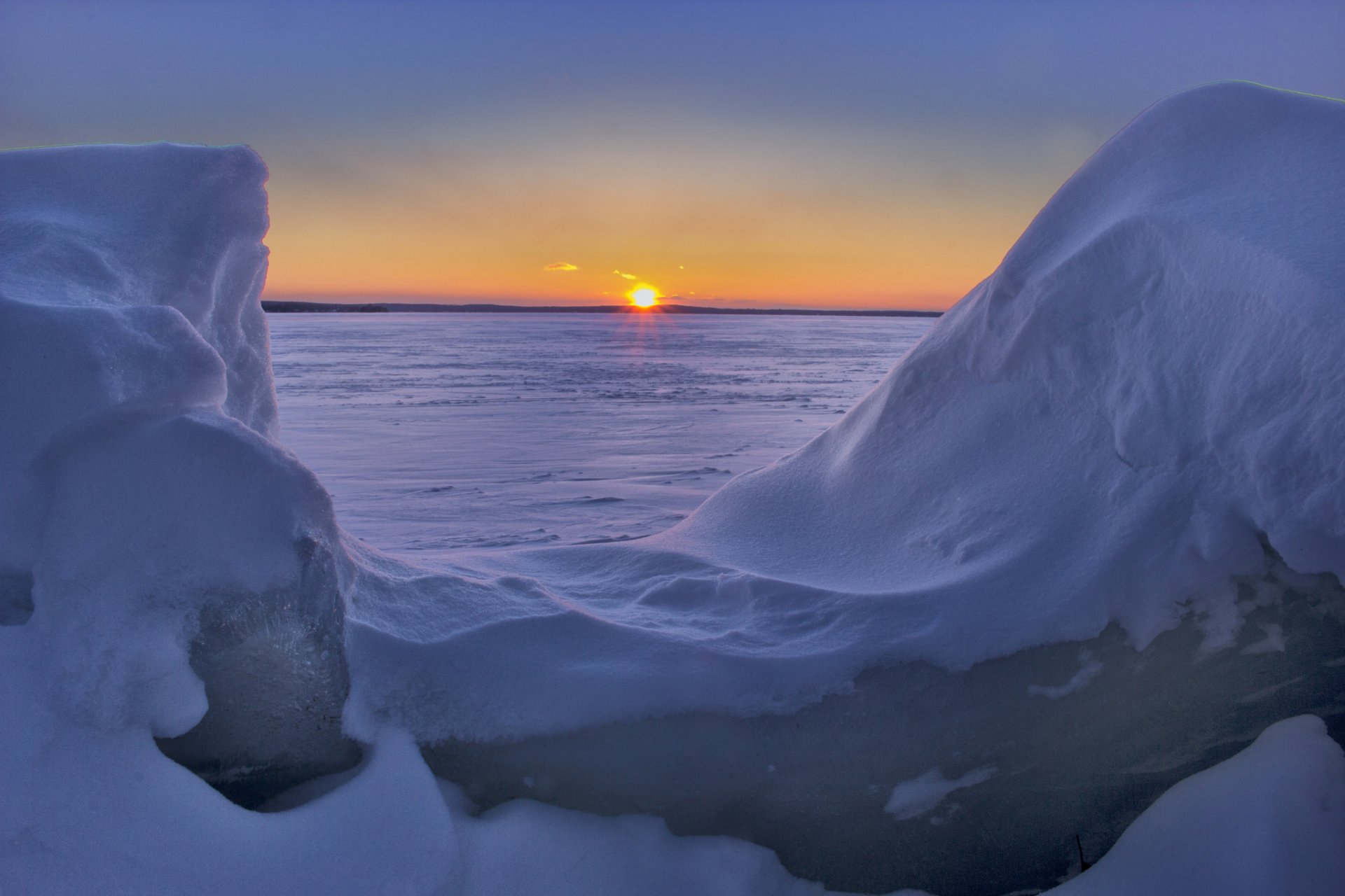 higgins lake michigan lake higgins winter snow drifts sunset