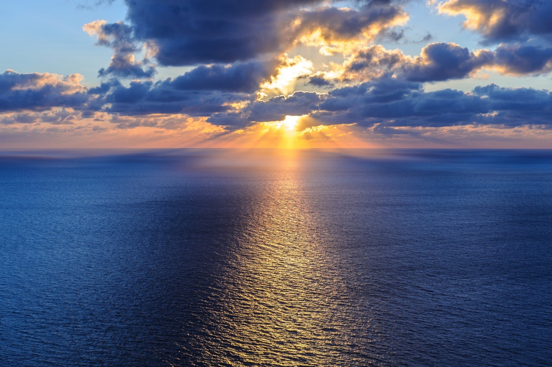 oceano acqua cielo sole nuvole orizzonte