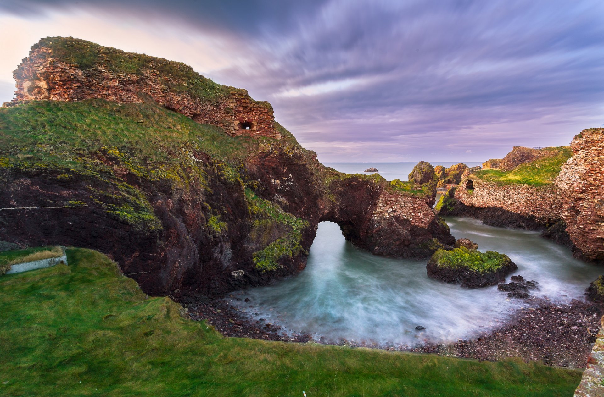 cotland sky clouds beach rock castle ruin