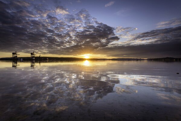 Sunset reflection on the water surface of Lake Fairlie