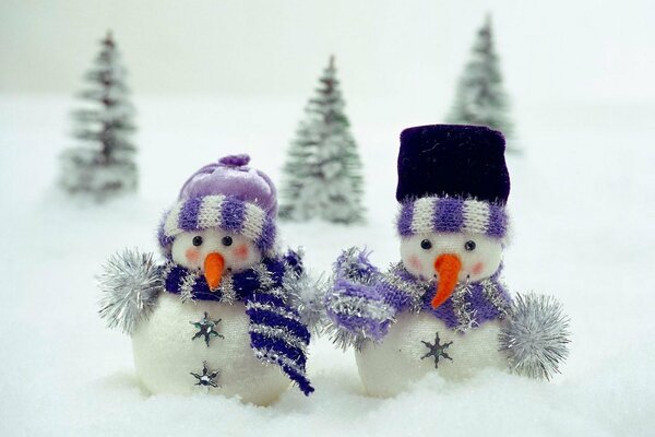 Children s toys snowmen in the snow