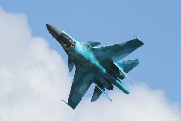 Flight of the SU 34 fighter in the sky