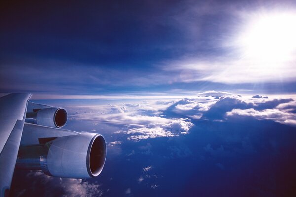 The sun above the clouds view from the plane