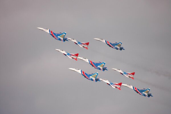 Russian knights show aerobatics in the sky on Su-27 and mig-29 aircraft