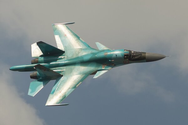 SU 34 bomber in cloudy sky