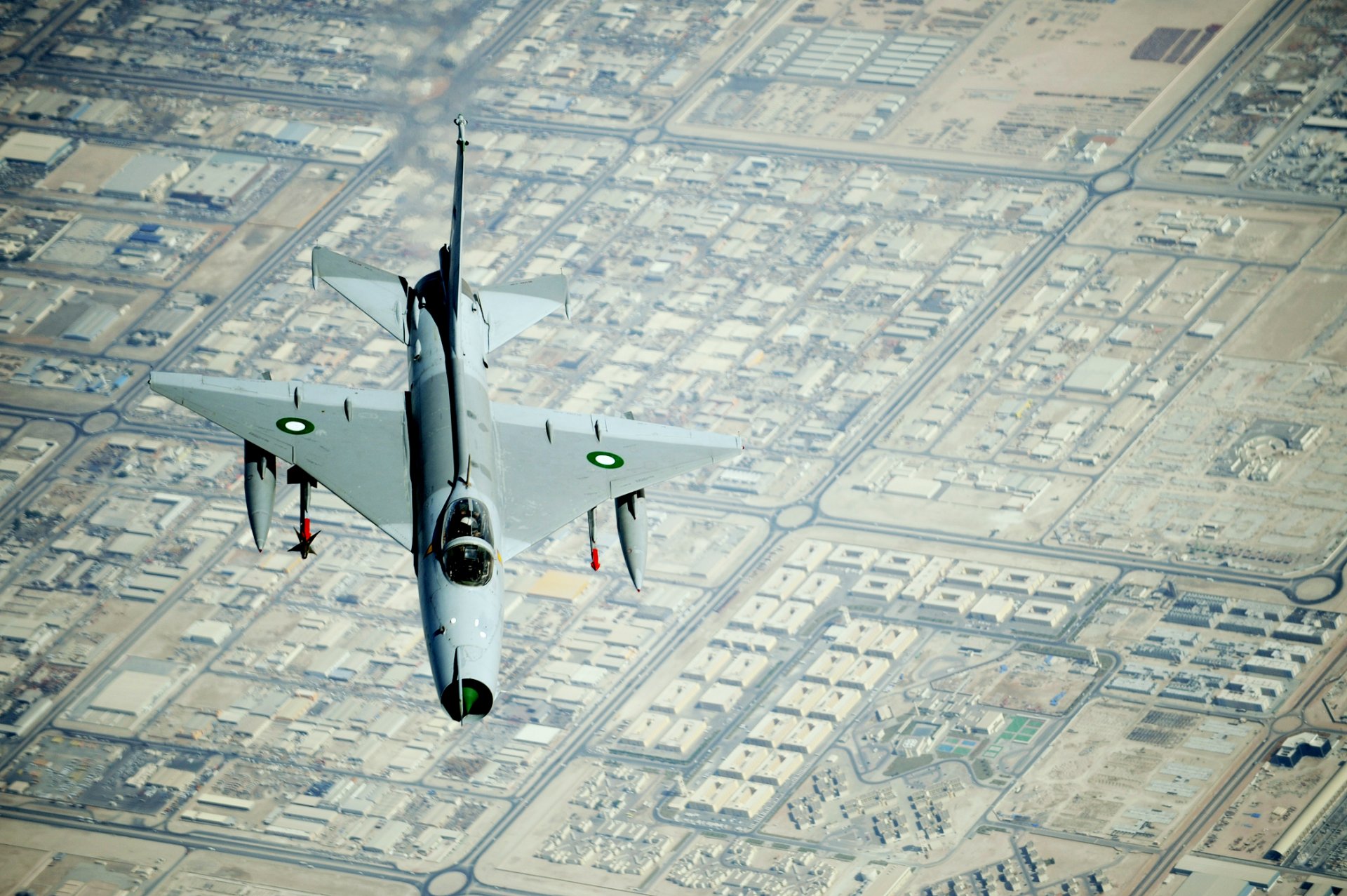 chinese jet aircraft chengdu j-7 f-7 pakistan training flight town view from the top