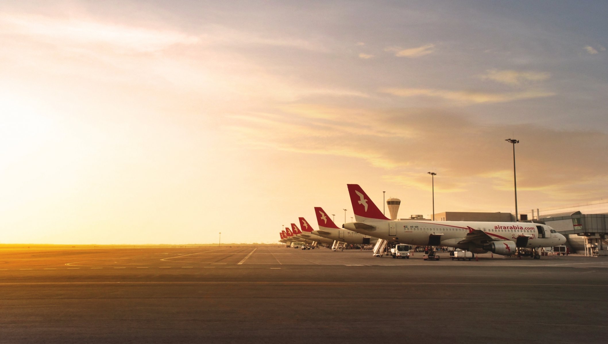 air arabia boeing plane many aviation airport light sunset a side view