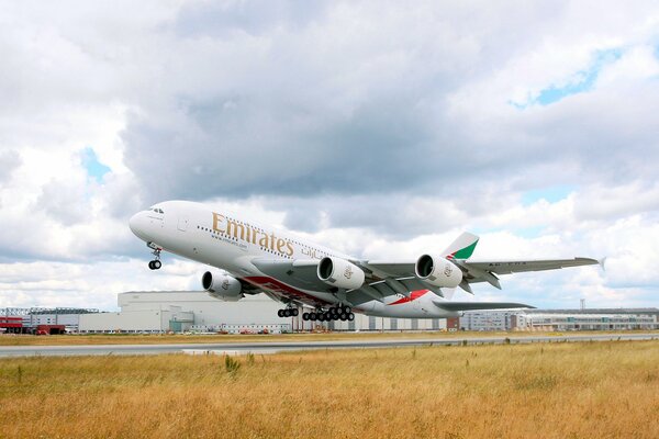 Emirates airline plane on take-off