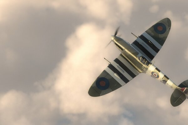 An English plane flying in the clouds