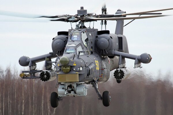 The attack helicopter is flying, the weather is moderate