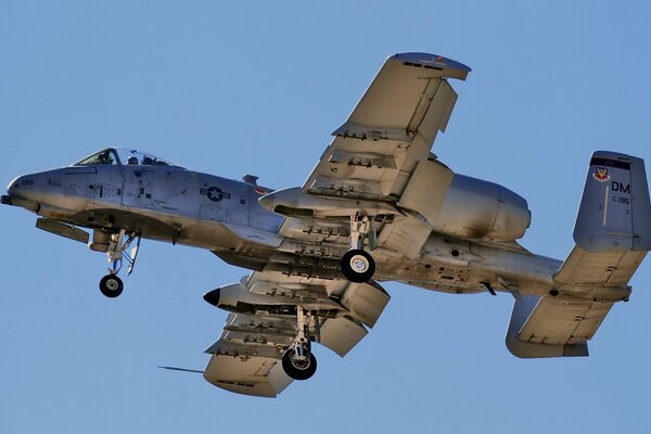 Combat aircraft flying in the blue sky