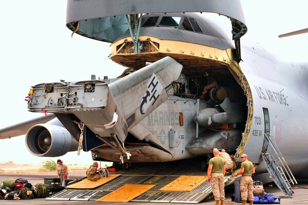 Loading the aircraft into the cargo hold