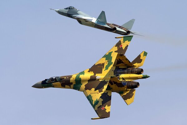 T-50 and Su-35 fighters are circling in the sky