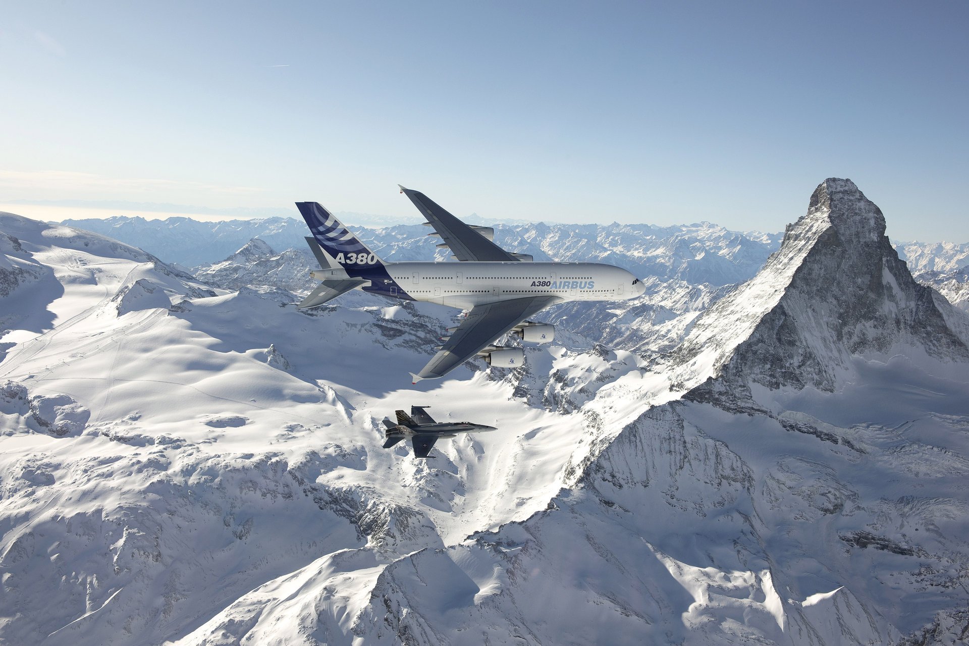 airbus a380 passenger airplane liner mcdonnell f / a-18 hornet deck fighter-bomber sky flight altitude mountains snow