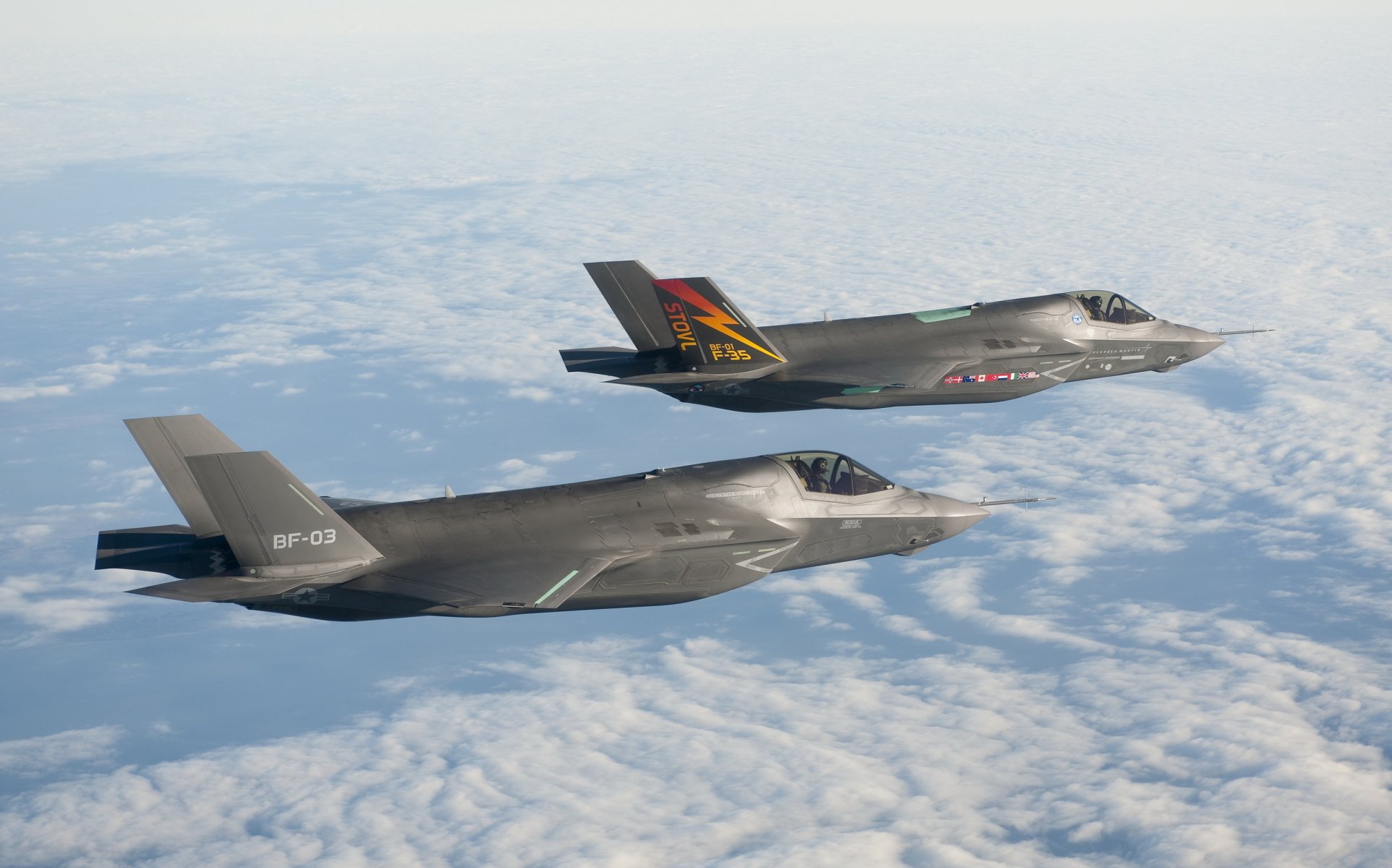 f-35 lightning ii lightning fighter-bomber of the fifth generation sky clouds height flight