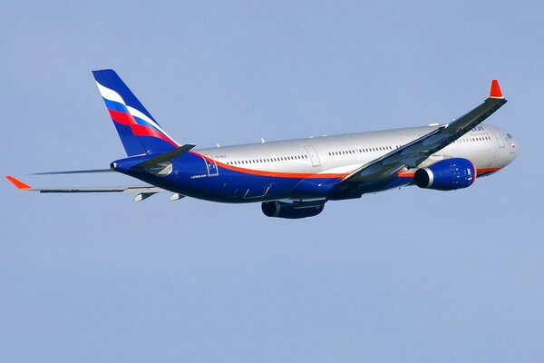 A huge Aeroflot plane in the blue sky