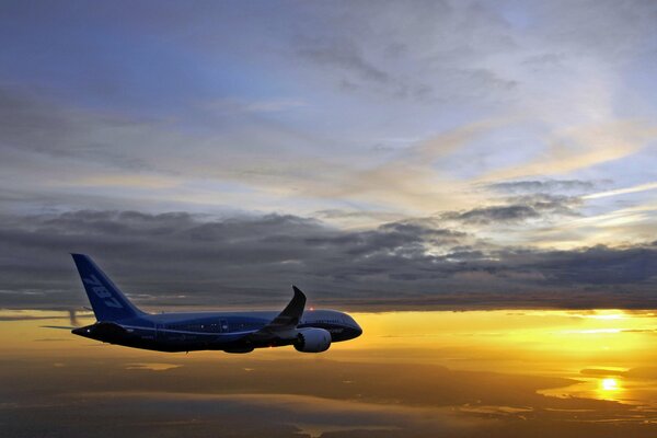 Boeing participating in flight tests at sunset