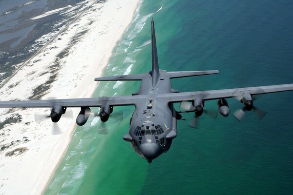 AC-130h blackbird aircraft in flight over the coast of Florida