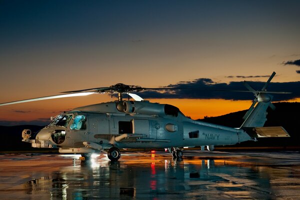 American sea howk helicopter at sunset