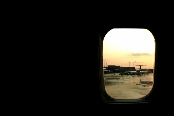 Photo from the window of an airplane at the airport