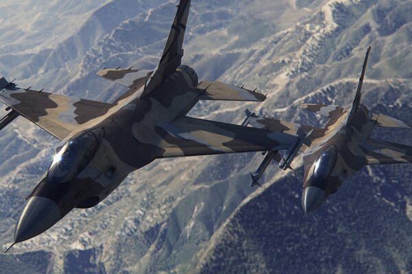 Deux avions de combat dans le ciel, camouflage