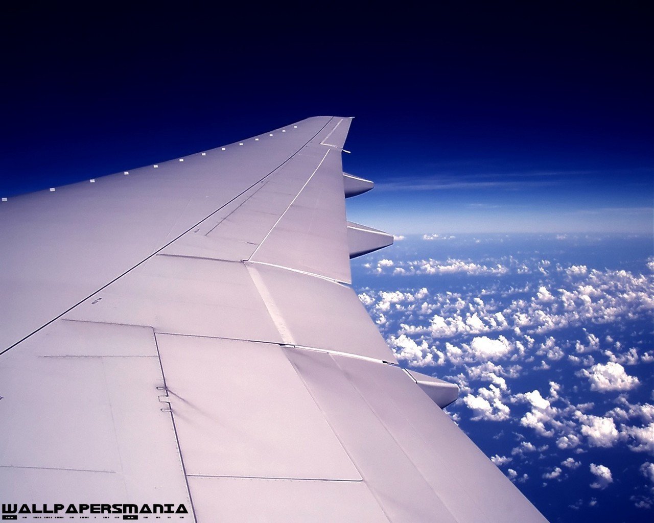 avión ala nubes