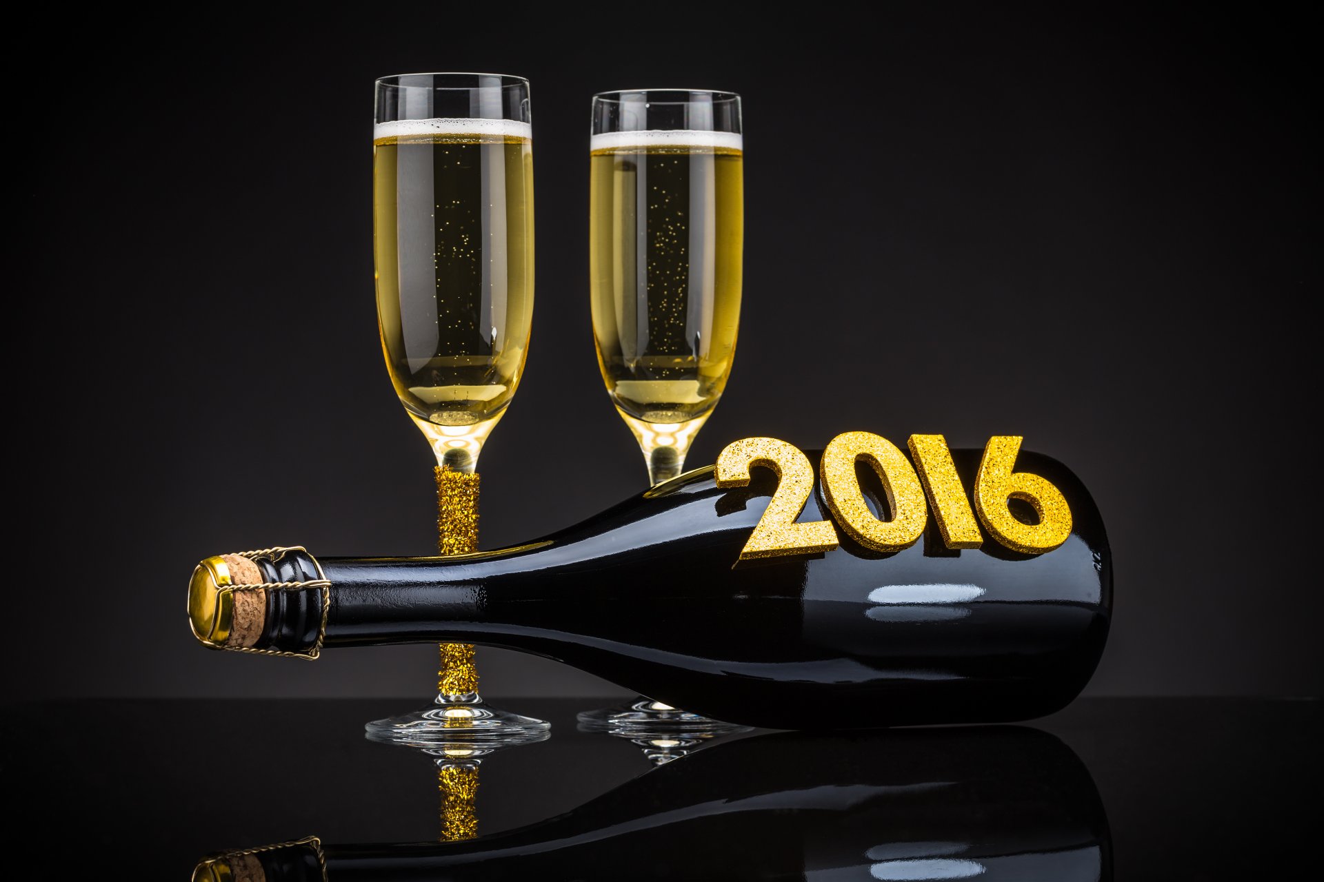 2016 feliz año nuevo oro champán botella copas de vino