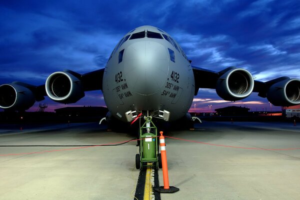 Large military aircraft at the airport