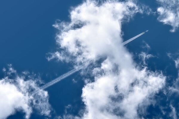 The trace of a flying plane in the sky