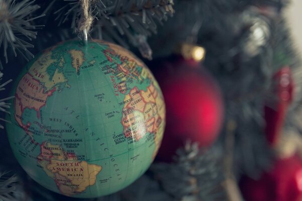 A globe in the form of a Christmas tree toy