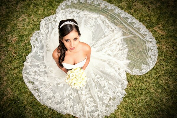 Bride in a white dress frame from above