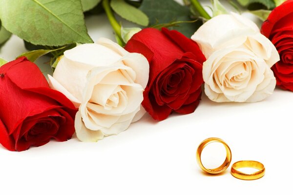 Obrychalevka wedding rings and roses