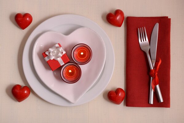 Romantic candlelit dinner with hearts