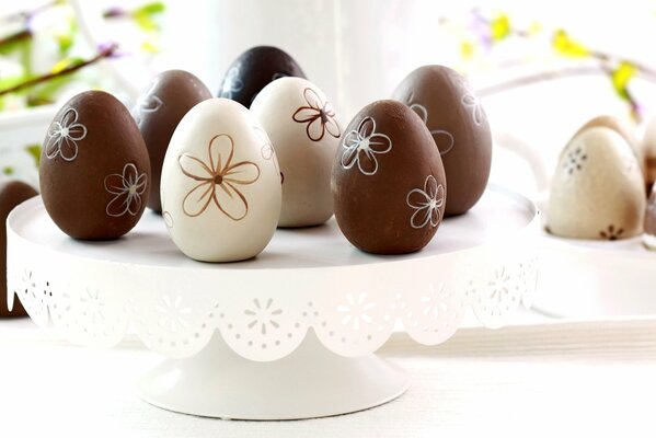 Easter eggs made of white and black chocolates