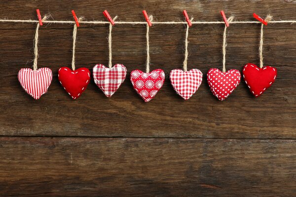 A few hearts with different patterns on a string