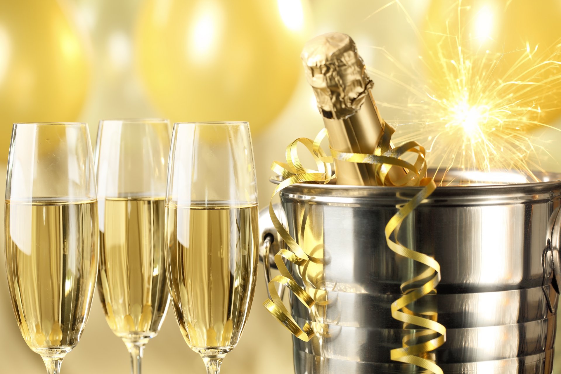 happy new year champagne golden celebration holiday glasses serpentine a bottle sparkler