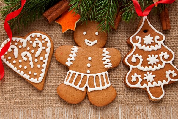 New Year gingerbread cookies: a heart, a man and a Christmas tree