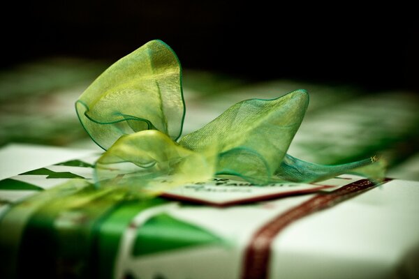 A beautiful gift with a green ribbon