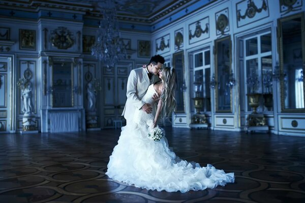 The bride and groom are alone in the palace