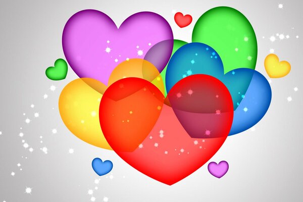 Transparent multicolored hearts on a gray background