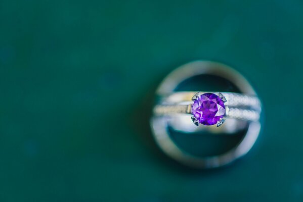 Ring with a large purple stone