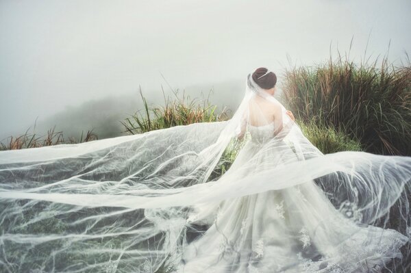 Asian girl in a chic wedding dress