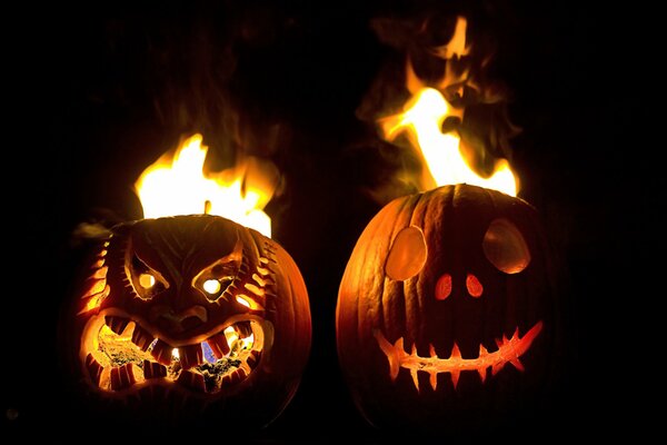 Burning Halloween pumpkins at night