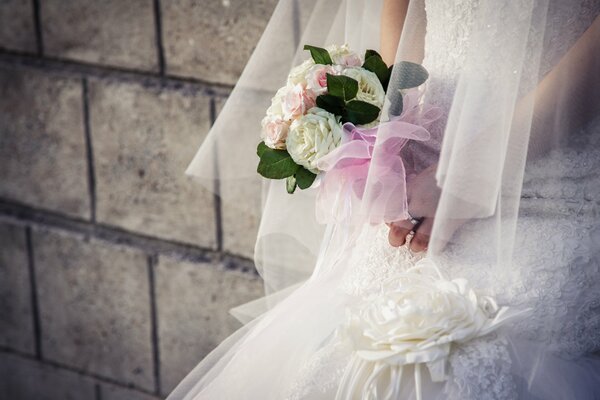 Wedding dress and bridal bouquet