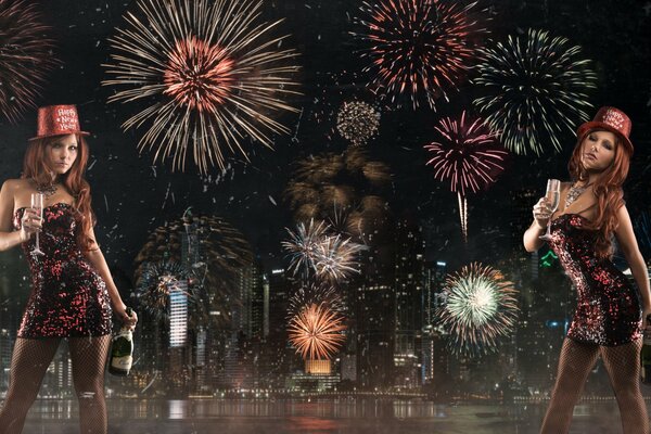 Beautiful girls drink champagne and admire fireworks in the night city